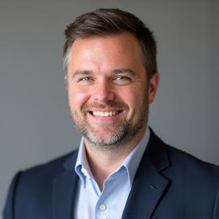 Professionelles Portrait von Dr. Johann Huber, Partner und Fachanwalt für Unternehmensrecht